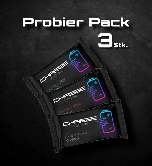 Charge Energy Bar Riegel für Unterwegs. Perfekt für Motorrad, Fahrrad, Rennrand, Wandern, Ski, Schule, Uni. Der leckere Snack mit Energie für Unterwegs. Schwarze Verpackung mit einer leuchtenden Batterie. Ein Probier Paket
